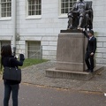 315-0564 Posing with Statue of John Harvard.jpg